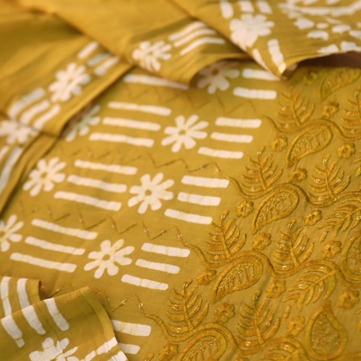 Gulshan Turmeric Yellow Thread Embroidered Hem Batik Printed Cotton Suit Set