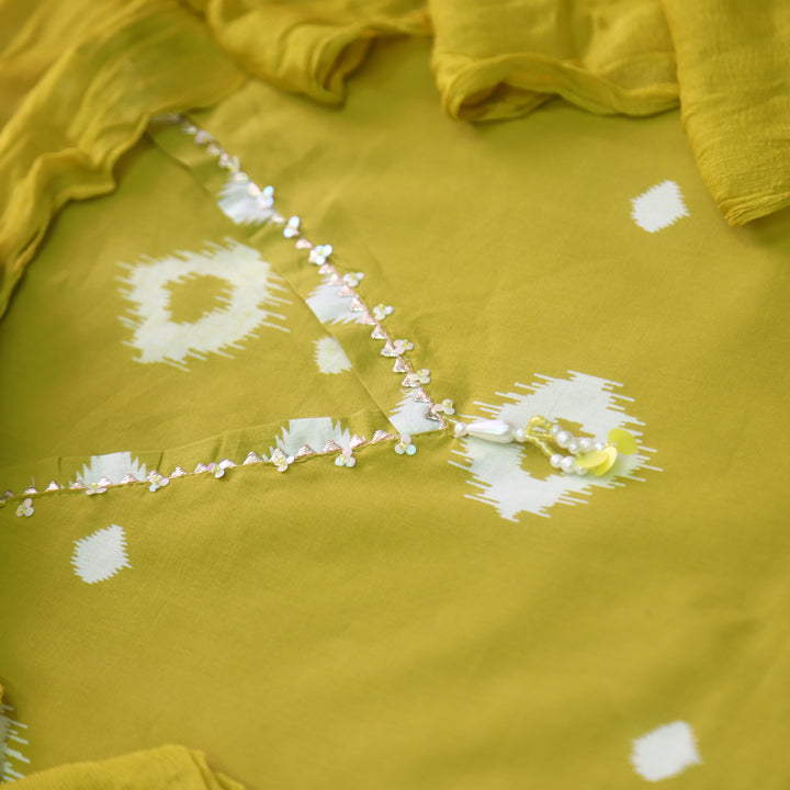 Aafreen Turmeric Yellow Hanging Detailing Work V Neck Ikkat Print Cotton Suit Set
