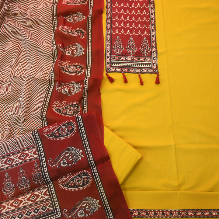 Lavanya Canary Yellow Ajrak Printed Patch with Tessels hanging Cotton Suit Set