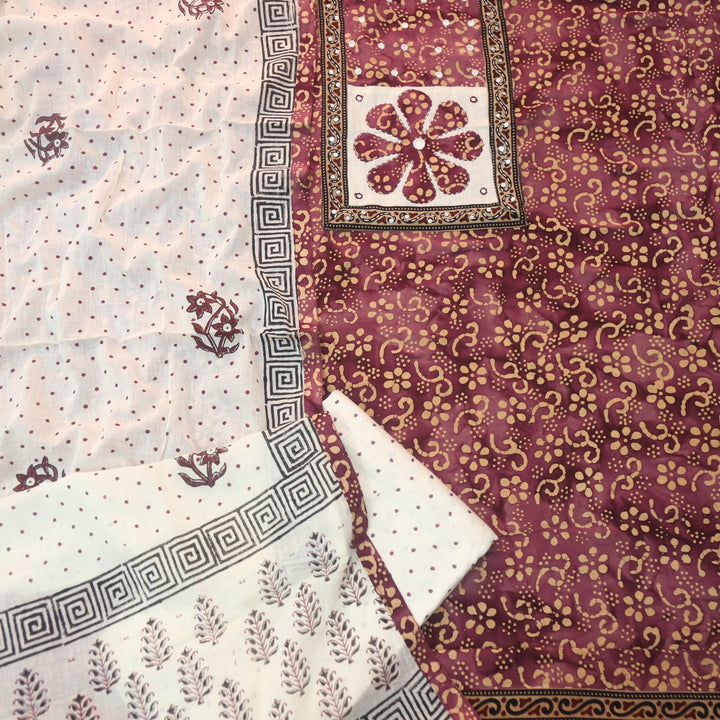Sadhgi Cranberry Red Applique Patch Neck Work in Batik Printed Cotton Suit Set