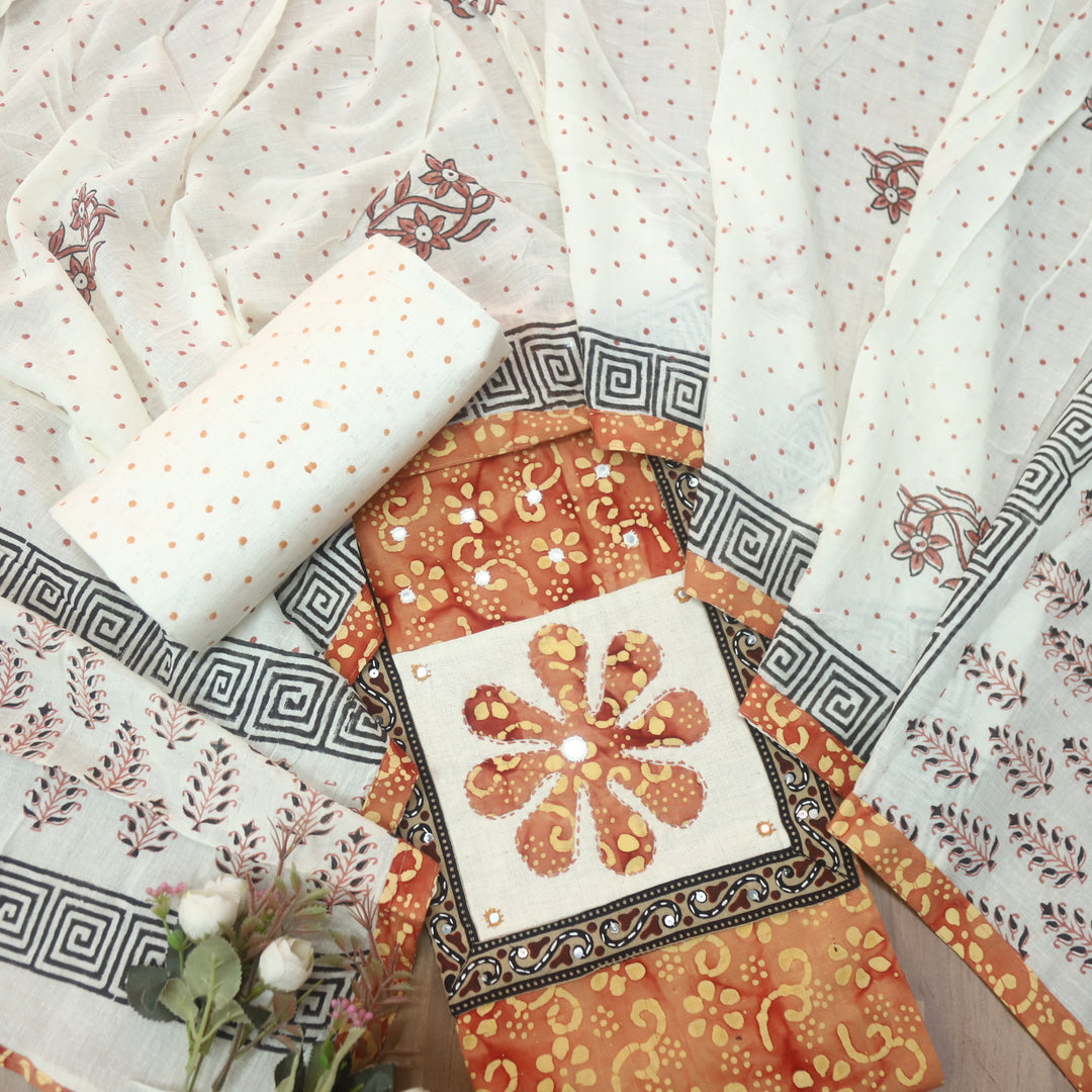 Sadhgi Tangerine Orange Applique Patch Neck Work in Batik Printed Cotton Suit Set