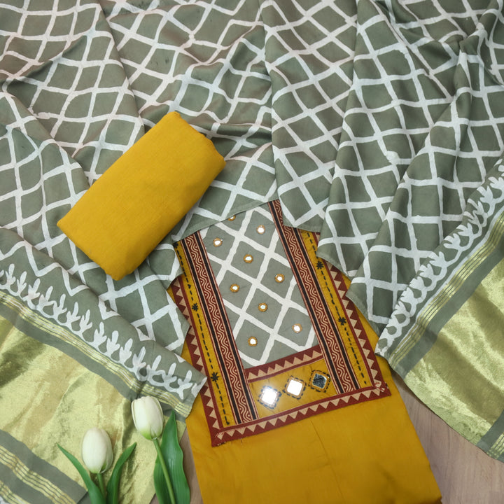 Nigahein Turmeric Yellow Printed Patch Neck with Mirror Work Jam Cotton Satin Suit Set
