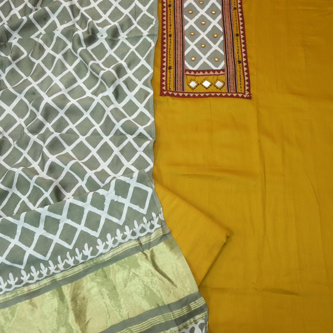 Nigahein Turmeric Yellow Printed Patch Neck with Mirror Work Jam Cotton Satin Suit Set