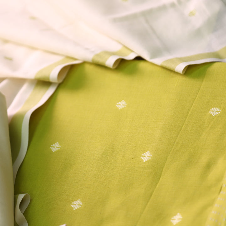 Wamiqa Olive Green All Over Thread Weaved Buti Work Cotton Suit Set