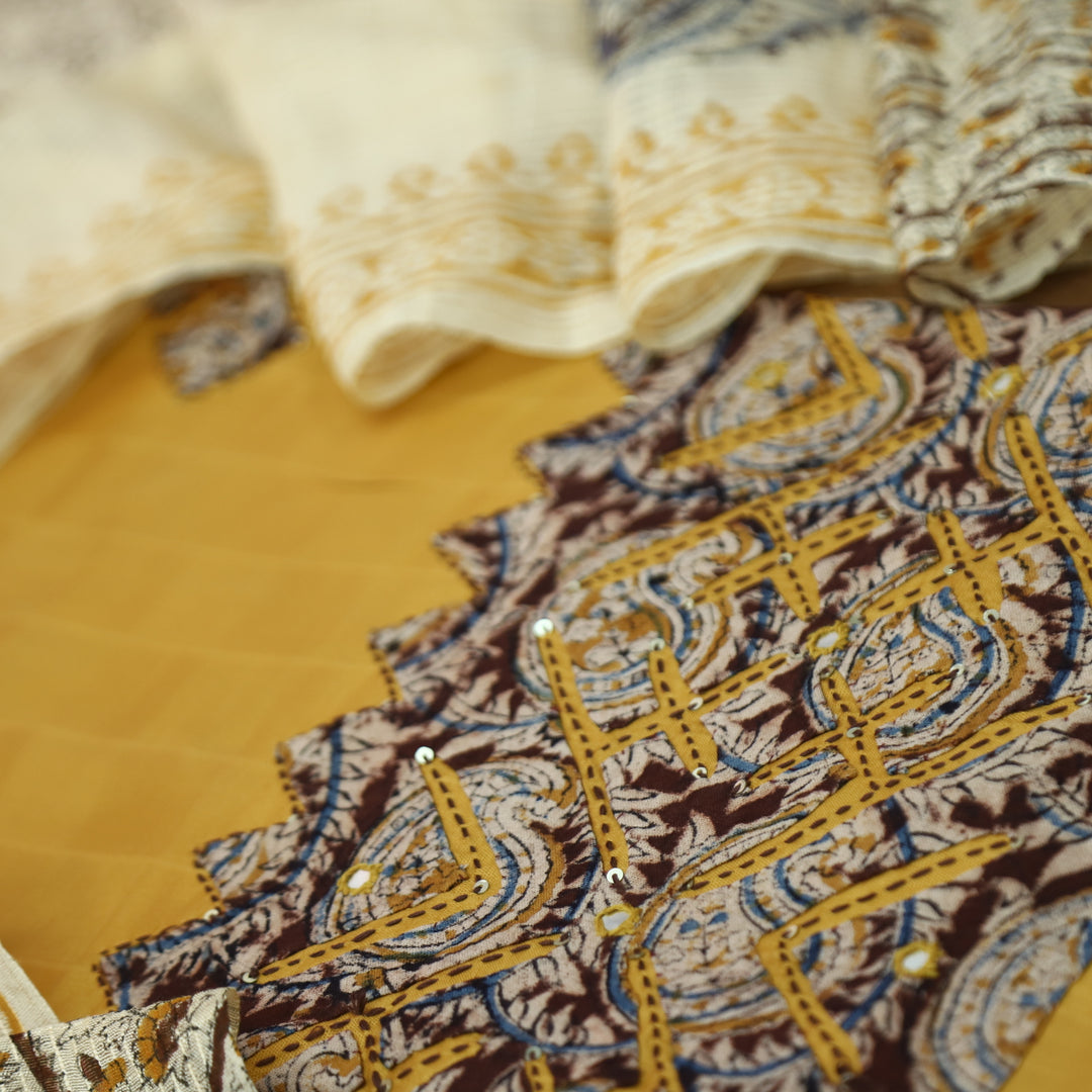 Sadhgi Pinaapple Yellow All Over Applique Patch Work in Kalamkari Print Cotton Suit Set