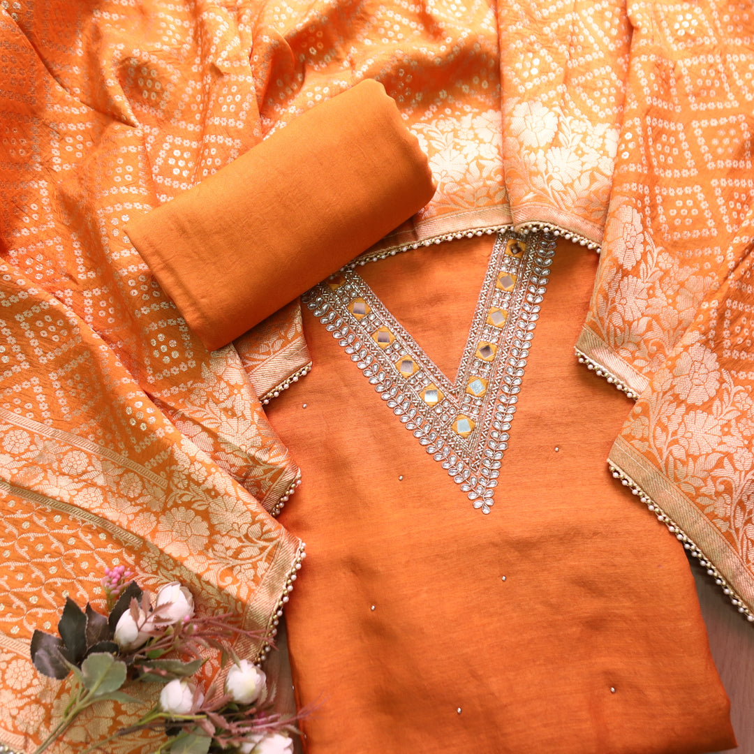 Naari Rust Orange Embellished V Neck with Stone and Mirror Work Dola Silk Suit Set