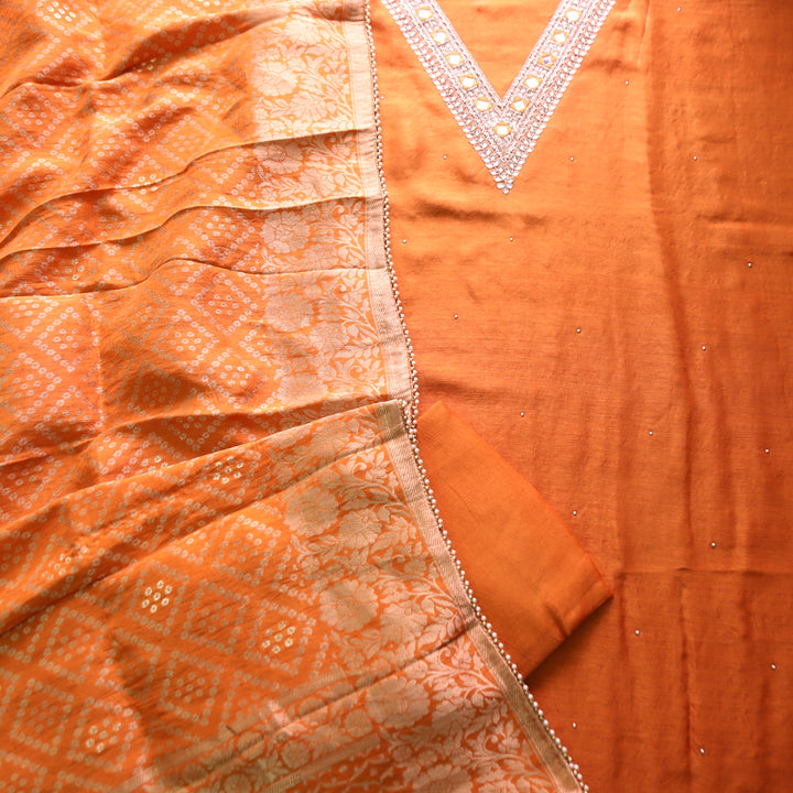Naari Rust Orange Embellished V Neck with Stone and Mirror Work Dola Silk Suit Set