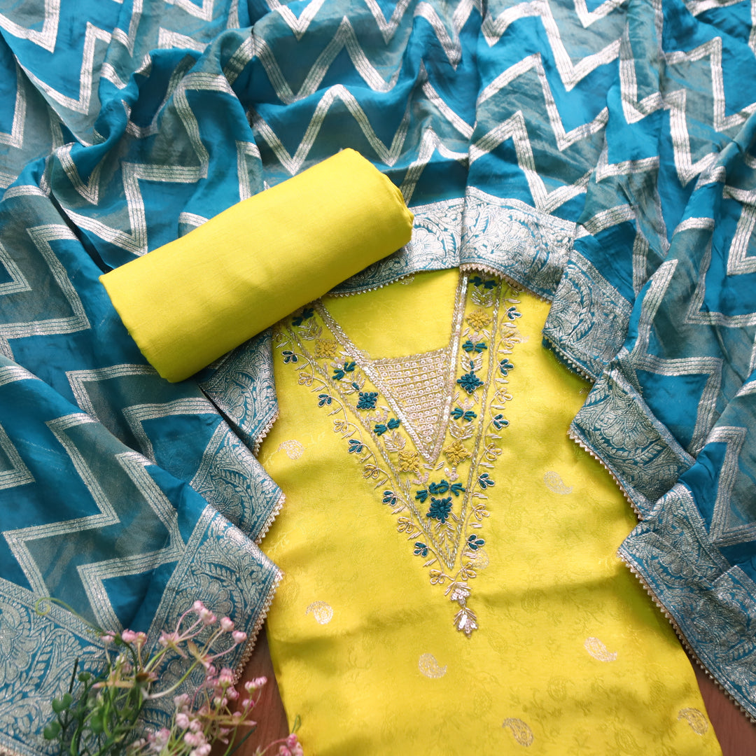 Naari Lemon Yellow V Neck Embellished Neckine in Brocade Work Dola Silk Suit Set