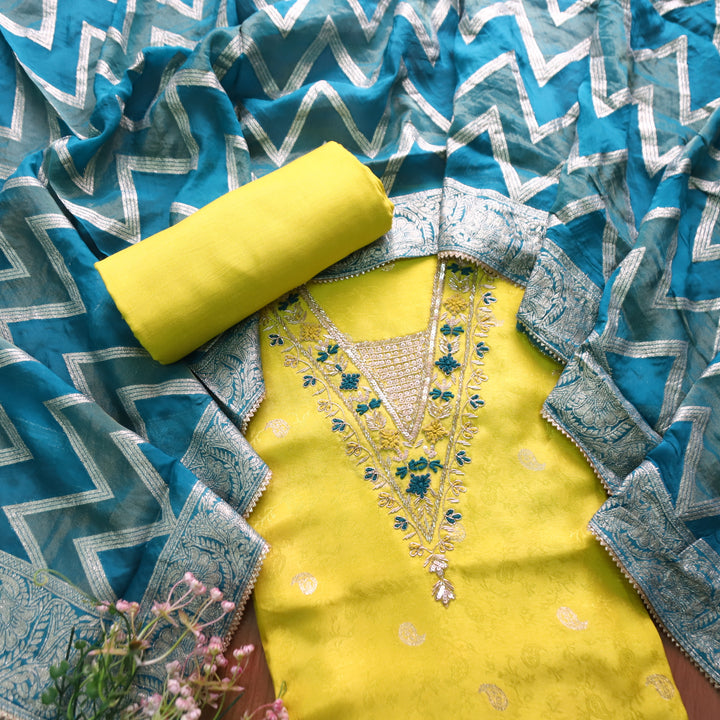 Naari Lemon Yellow V Neck Embellished Neckine in Brocade Work Dola Silk Suit Set