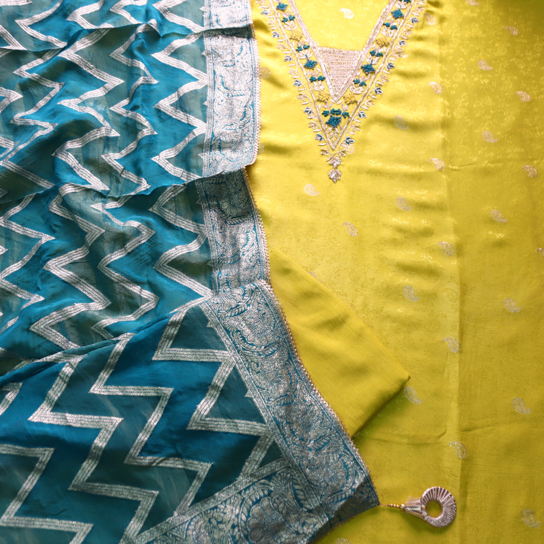 Naari Lemon Yellow V Neck Embellished Neckine in Brocade Work Dola Silk Suit Set