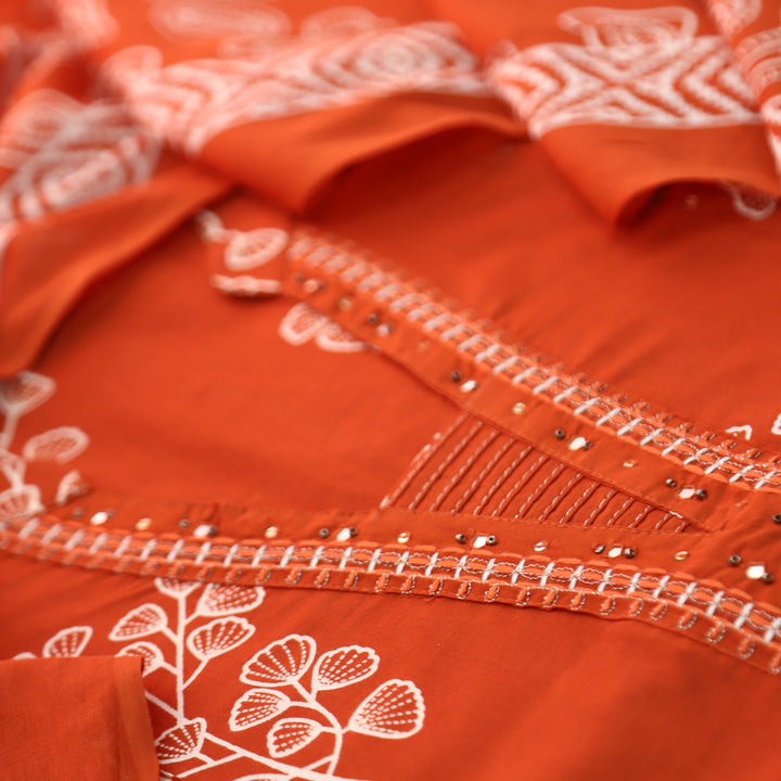 Gujaarish Rust Orange Zari Neck Work with Patra Floral Printed Cotton Suit Set