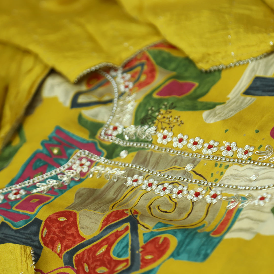 Sourya Bright Yellow Embellished Neckline with Zari and Moti Abstract Print Modal Set