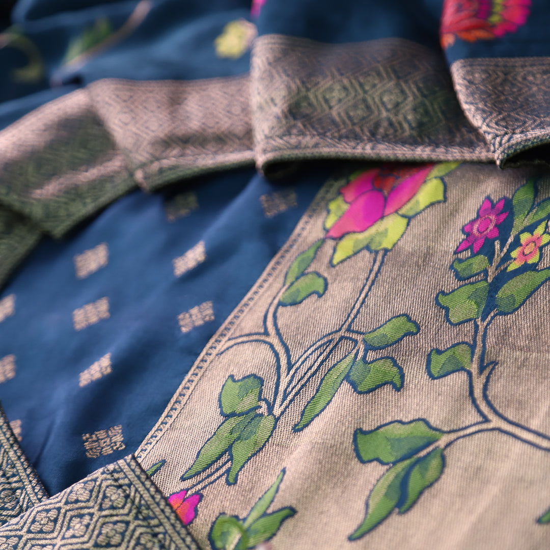 Darmiyan Cerulean Blue Floral Thread Work with Jacquard Weaving Hem Dola Silk Set