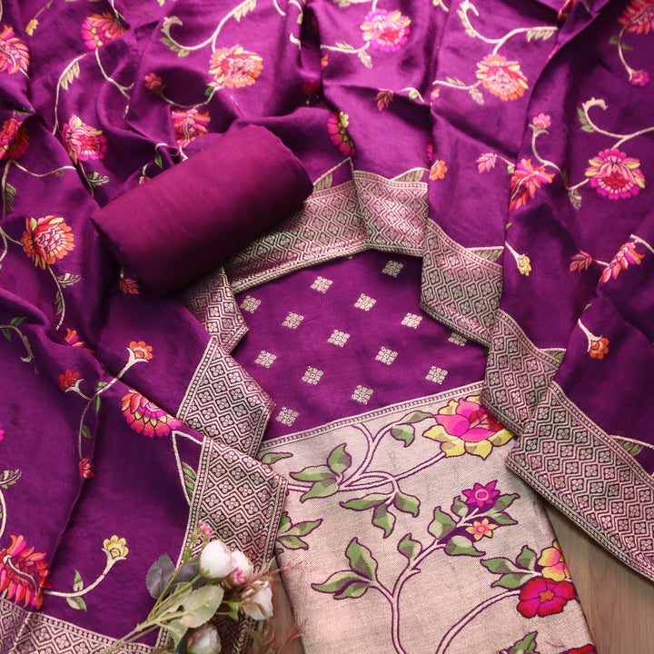 Darmiyan Vibrant Purple Floral Thread Work with Jacquard Weaving Hem Dola Silk Set