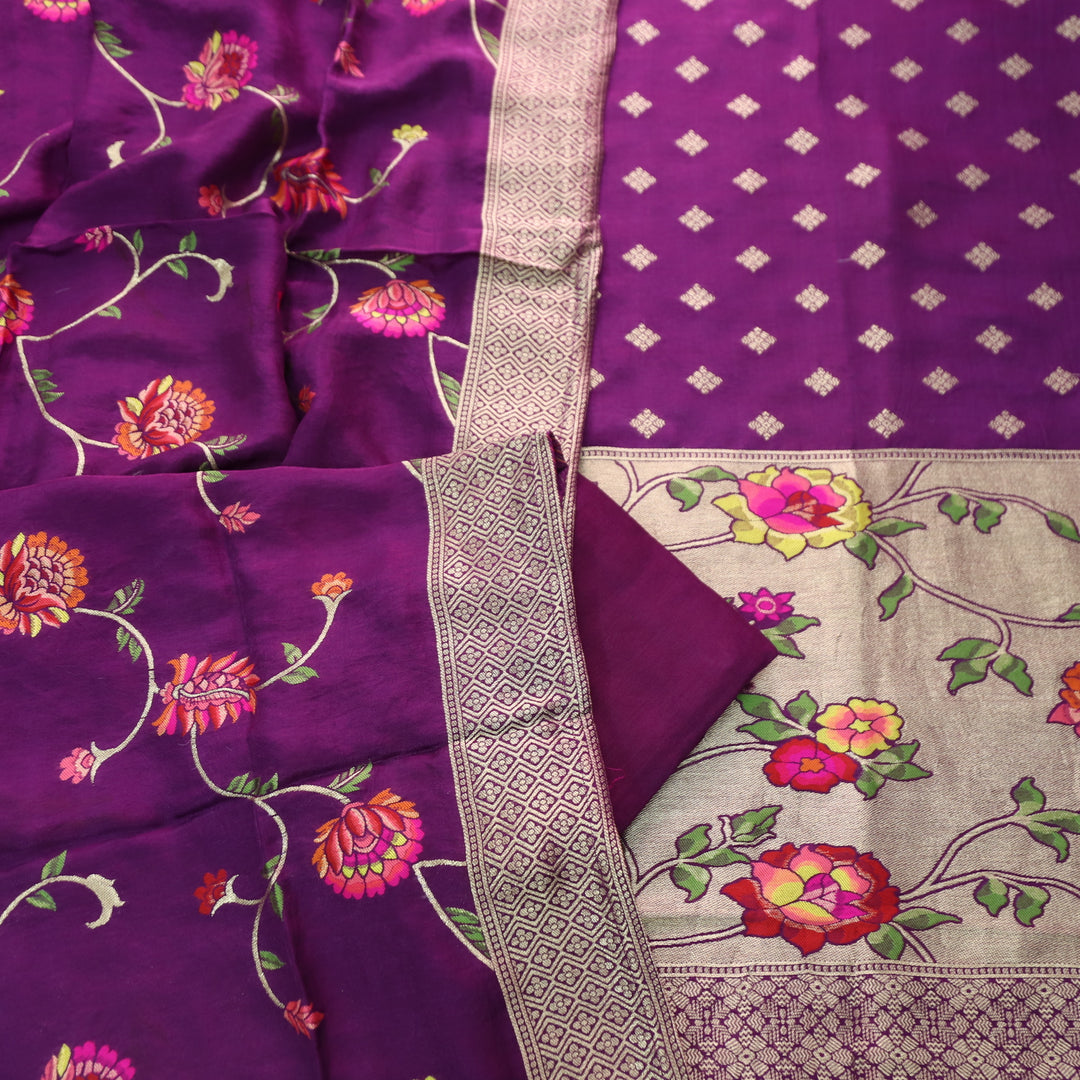 Darmiyan Vibrant Purple Floral Thread Work with Jacquard Weaving Hem Dola Silk Set