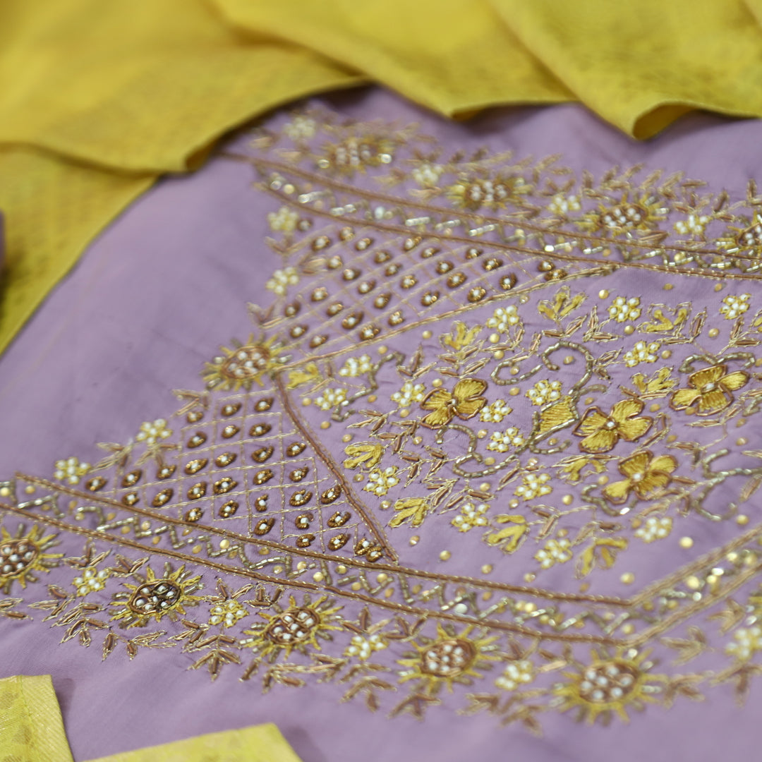 Riwaish Orchid Lilac Zari and Kardana Embellished Neck Work in Modal Suit Set