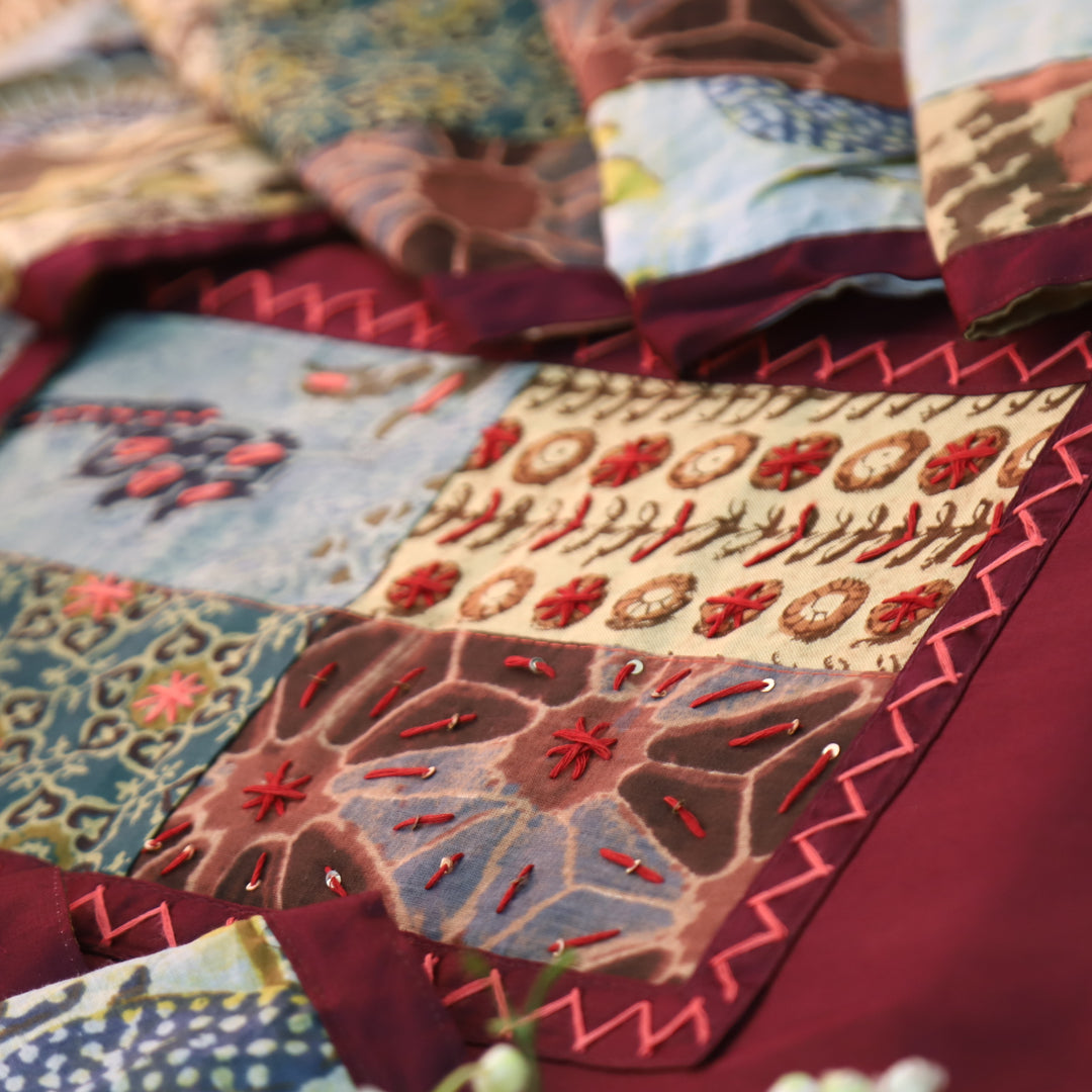 Aafeemi Wine Burgundy Ajrak Patches Work Yoke Neck Glazed Cotton Suit Set