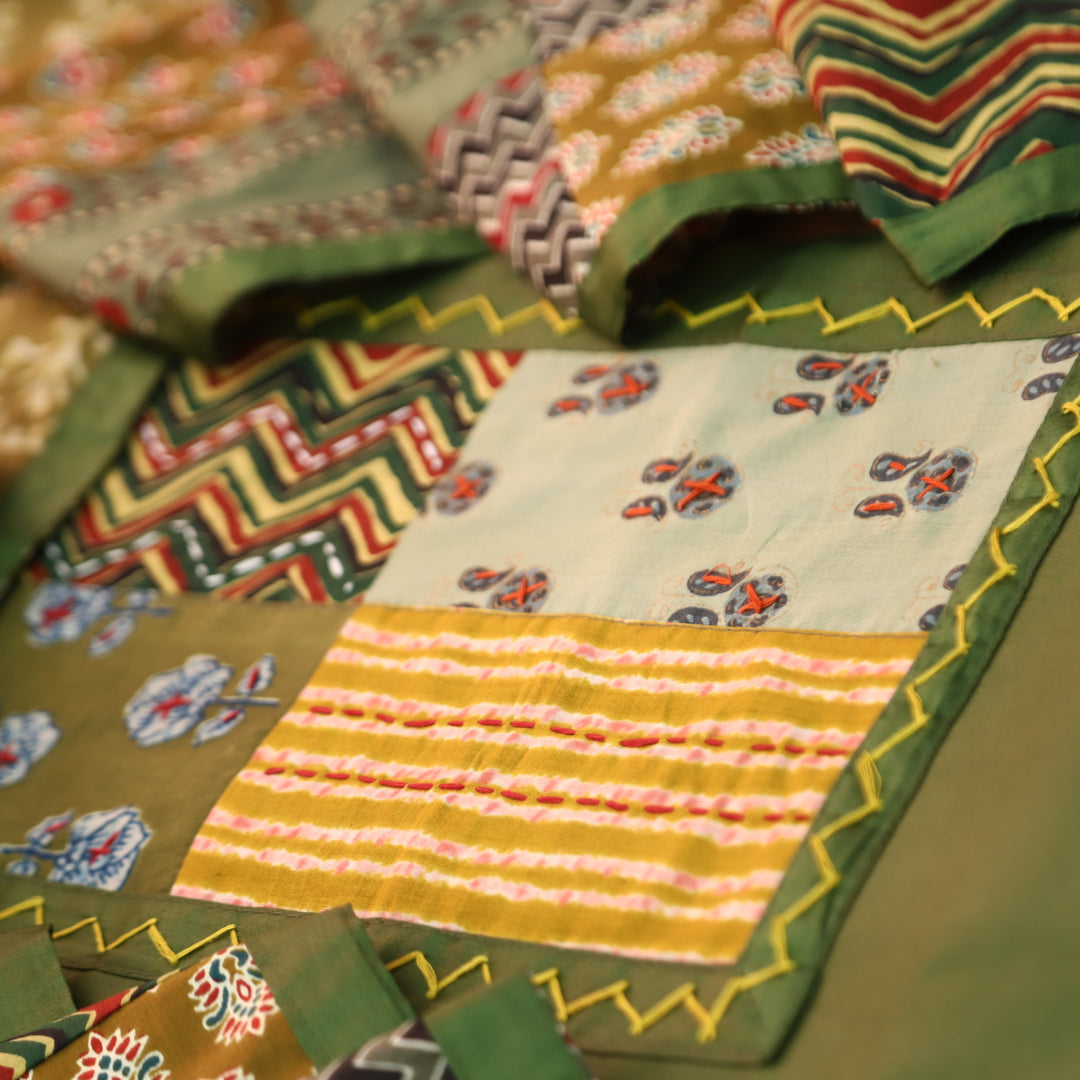 Aafeemi Fern Green Ajrak Patches Work Yoke Neck Glazed Cotton Suit Set