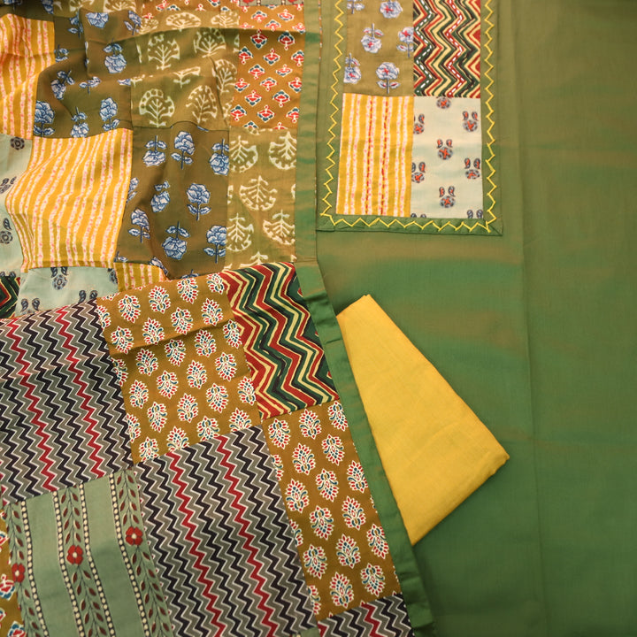 Aafeemi Fern Green Ajrak Patches Work Yoke Neck Glazed Cotton Suit Set