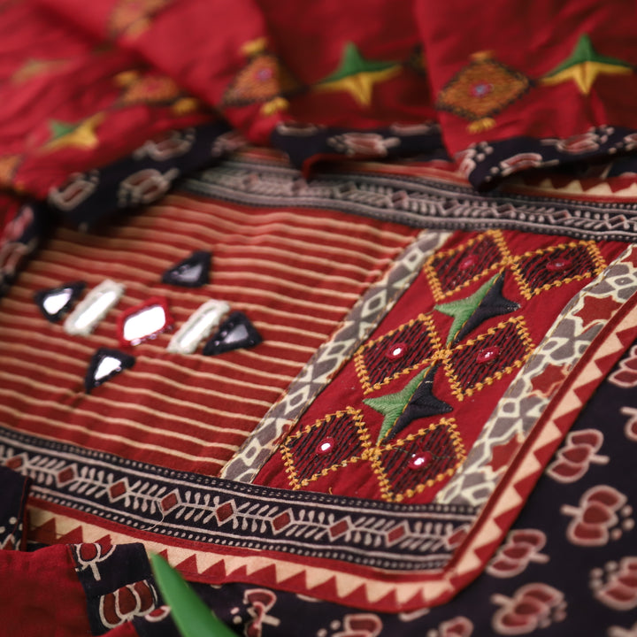 Dashtaan Oil Black Kutch Patch with Mirror Work Lotus Printed Cotton Suit Set