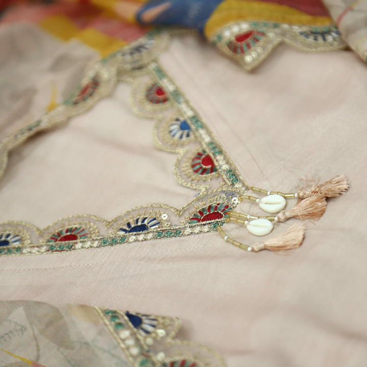 Naari Frappe Beige V Neck Lace with Shell Hanging and Floral Patch Work Muslin Set