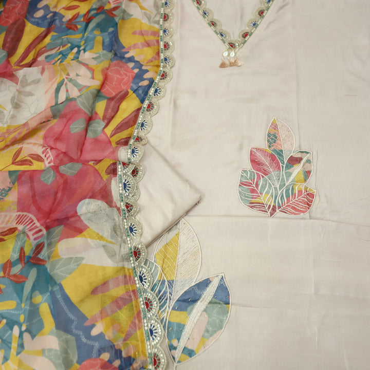 Naari Frappe Beige V Neck Lace with Shell Hanging and Floral Patch Work Muslin Set