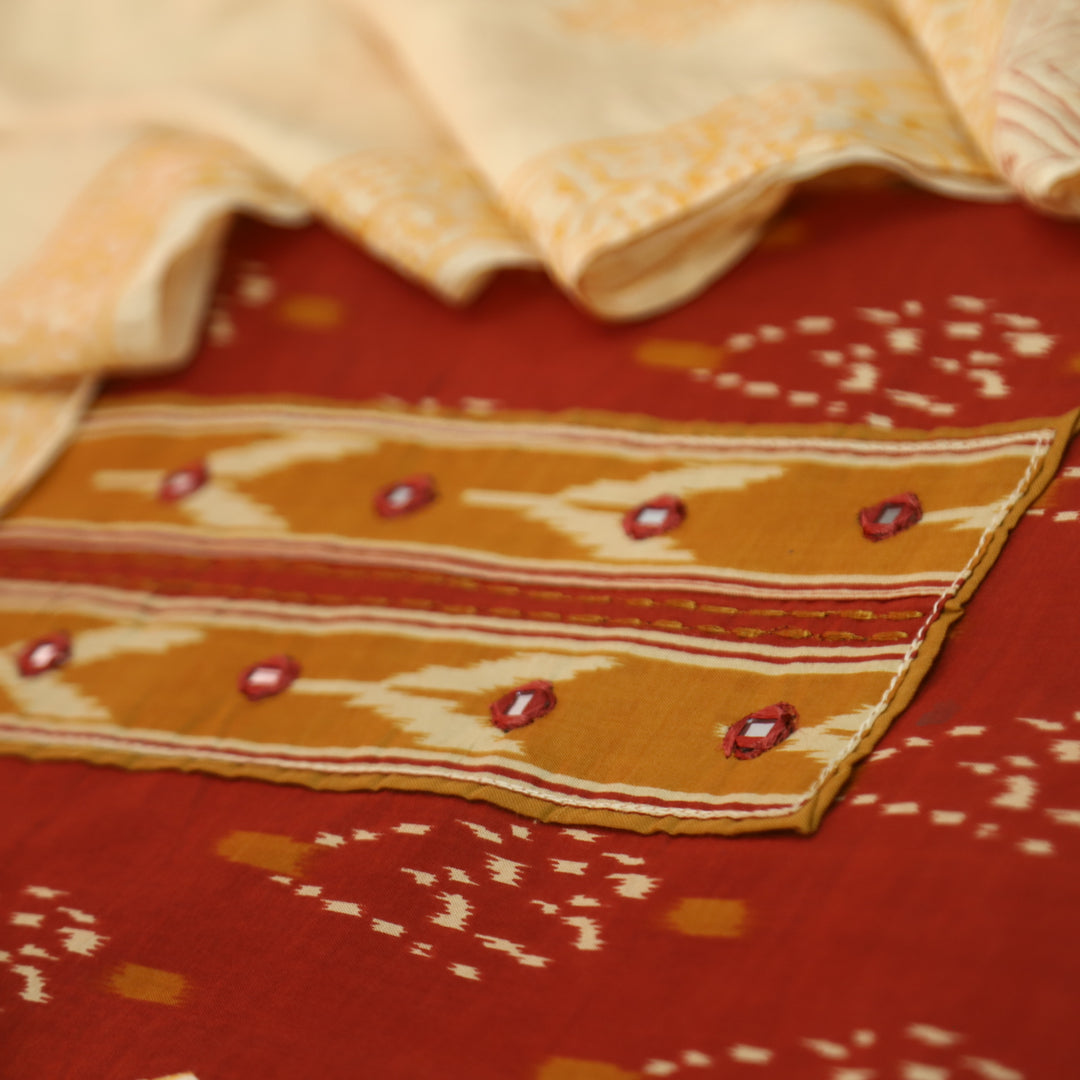 Suroor Rust Orange Ikkat Print Patch with Mirror in Ikkat Print Cotton Suit Set