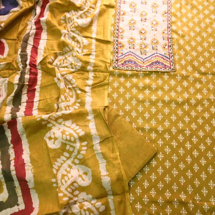 Noorani Turmeric Yellow French Knot Work Yoke Neck in Printed Cotton Suit Set