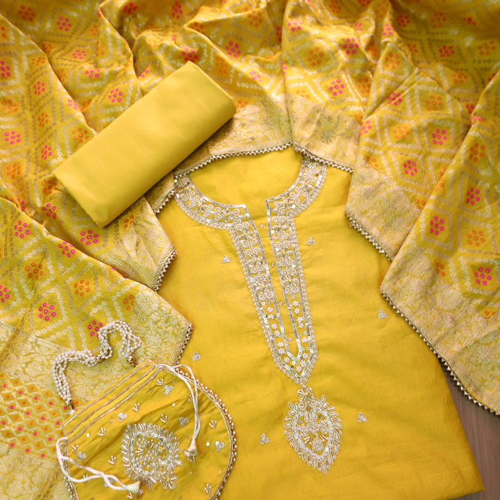 Sohini Sunflower Yellow Embellished Neckline Work Chanderi Suit Set with Potli Bag