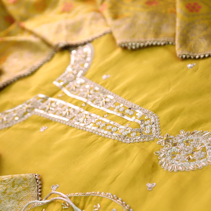 Sohini Sunflower Yellow Embellished Neckline Work Chanderi Suit Set with Potli Bag