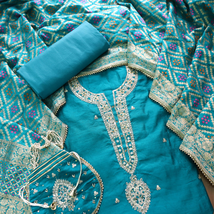 Sohini Cerulean Blue Embellished Neckline Work Chanderi Suit Set with Potli Bag