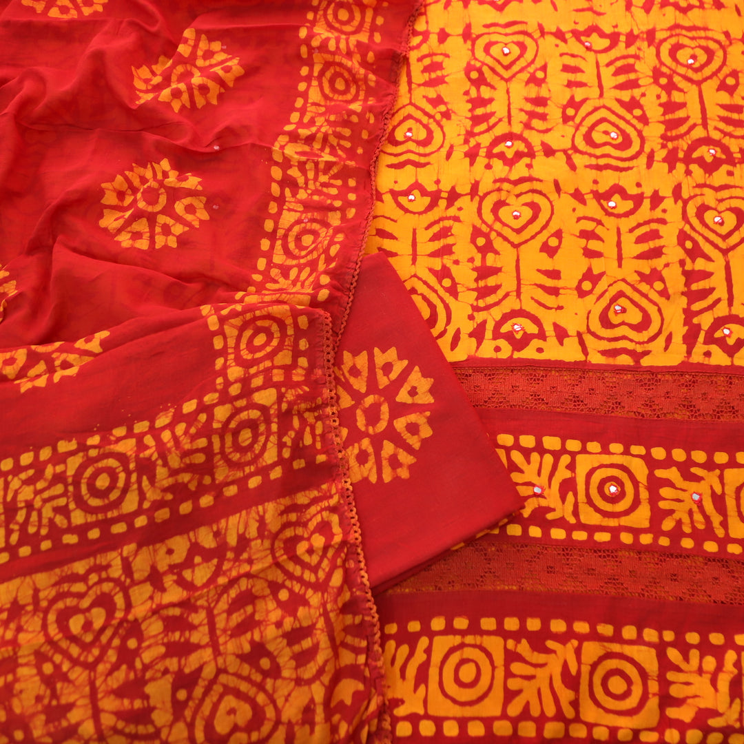 Sanskriti Burnt Rust All Over Batik Printed Work with Lace Cotton Suit Set
