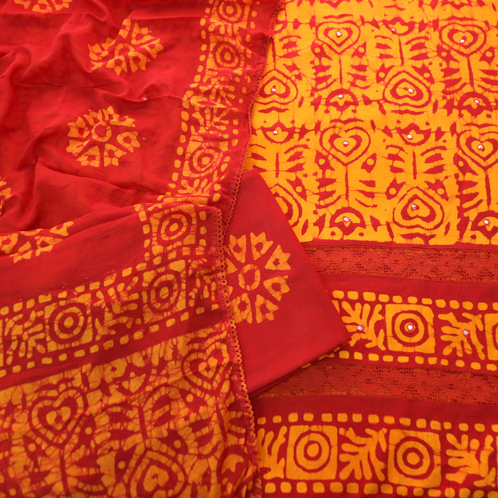 Sanskriti Burnt Rust All Over Batik Printed Work with Lace Cotton Suit Set