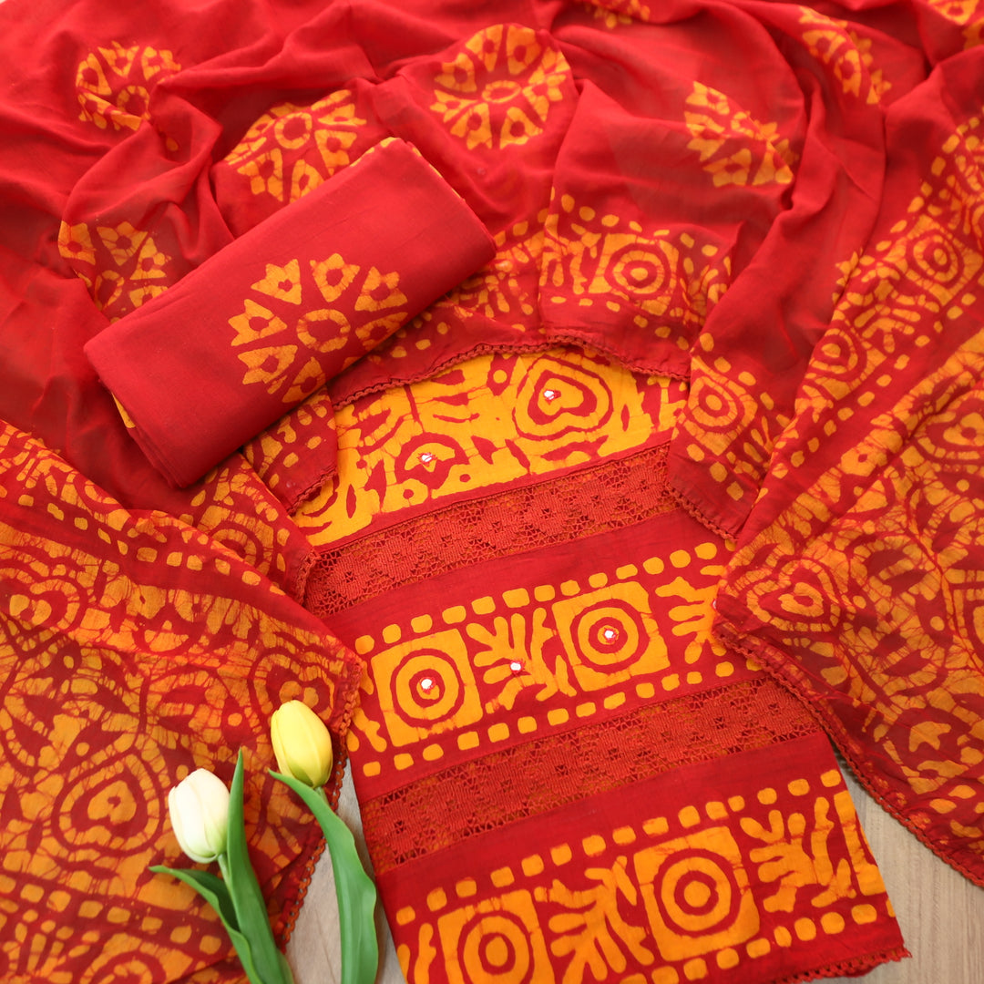 Sanskriti Burnt Rust All Over Batik Printed Work with Lace Cotton Suit Set