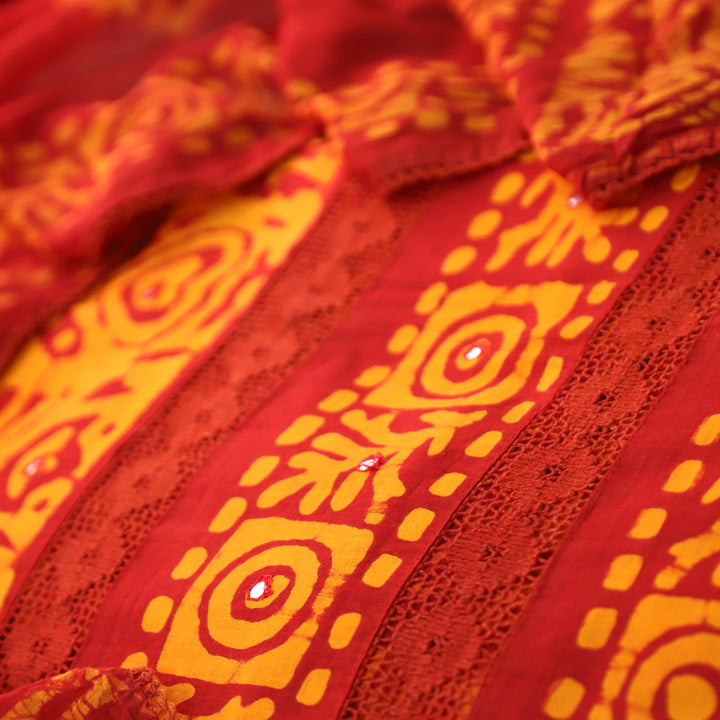 Sanskriti Burnt Rust All Over Batik Printed Work with Lace Cotton Suit Set