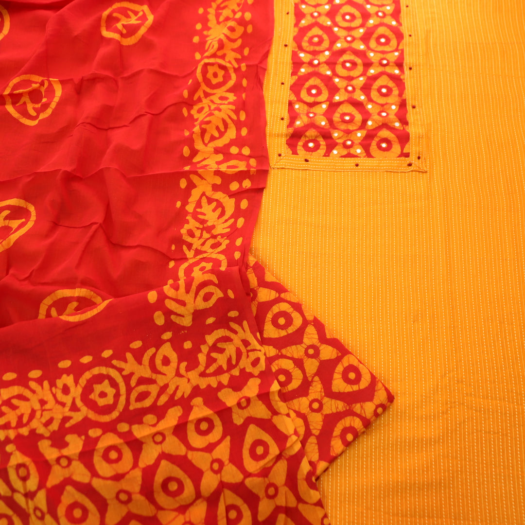 Sanskriti Tangerine Orange Batik Print with Patra Work Rinning Stitch Cotton Suit Set-D1