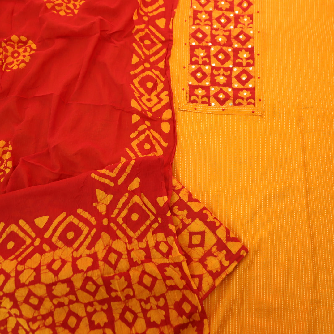Sanskriti Tangerine Orange Batik Print with Patra Work Rinning Stitch Cotton Suit Set-D2