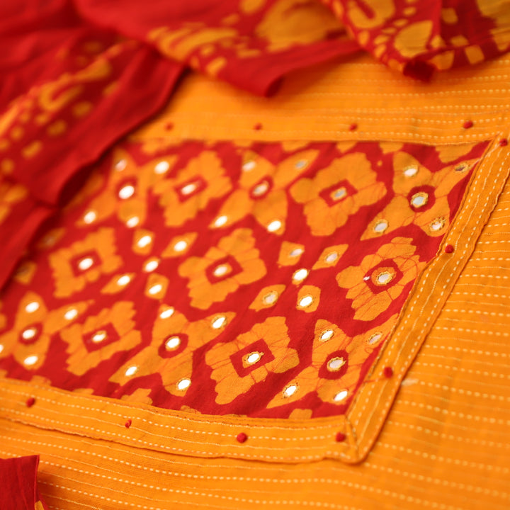 Sanskriti Tangerine Orange Batik Print with Patra Work Rinning Stitch Cotton Suit Set-D3