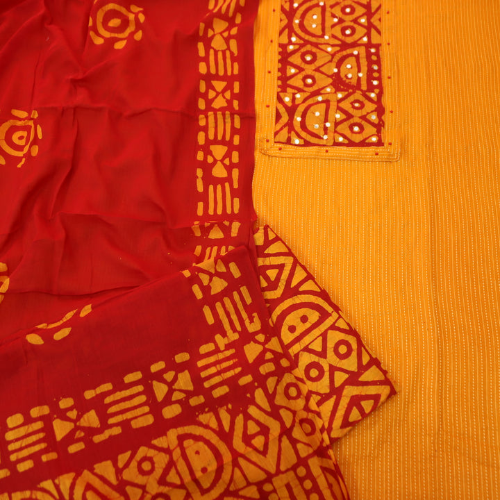 Sanskriti Tangerine Orange Batik Print with Patra Work Rinning Stitch Cotton Suit Set-D4