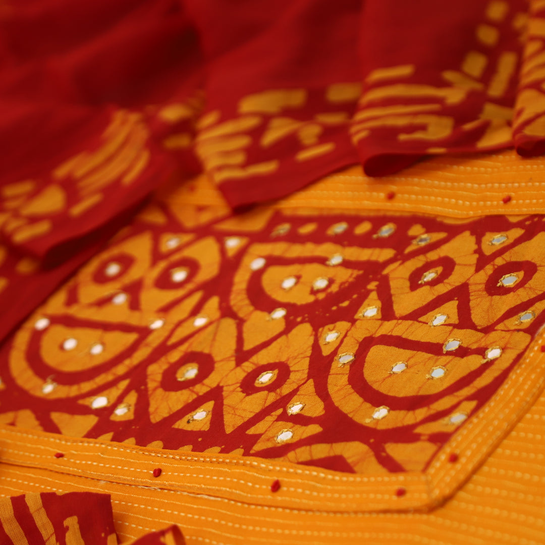 Sanskriti Tangerine Orange Batik Print with Patra Work Rinning Stitch Cotton Suit Set-D4