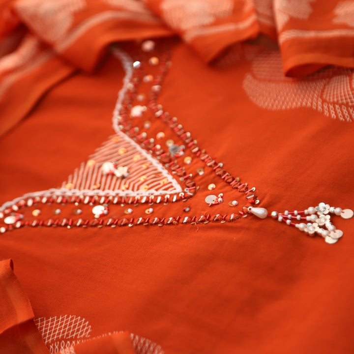 Yashvi Burnt Orange V Embellish Neckline Work with Floral Printed Cotton Suit Set