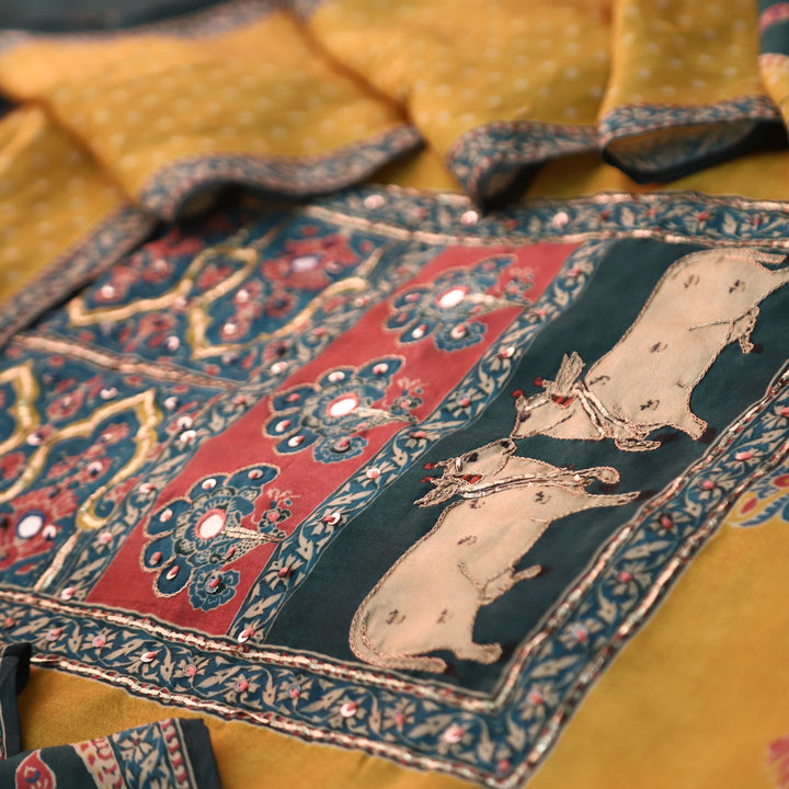 Dhaang Yellow Floral and Pichwai Print Embellish Neck Yoke and Hemline Muslin Set
