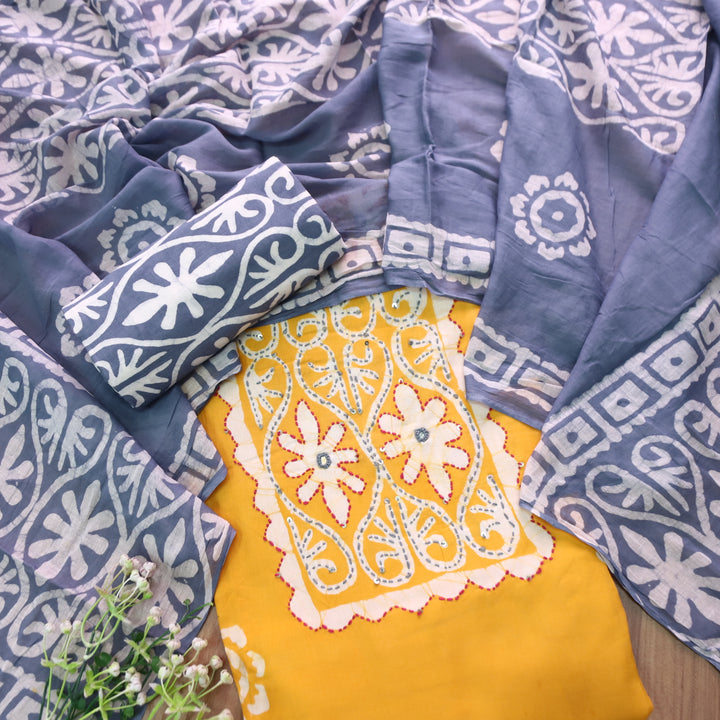 Zeenat Turmeric Yellow Kantha and Mirror Work in Batik Printed Cotton Suit Set