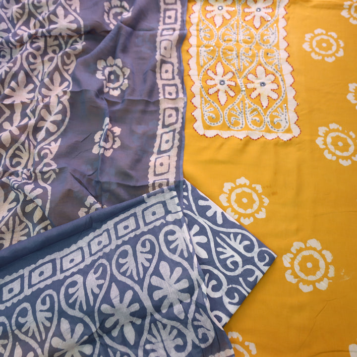 Zeenat Turmeric Yellow Kantha and Mirror Work in Batik Printed Cotton Suit Set