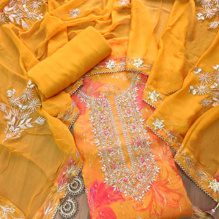 Sakhi Tangerine Yellow with Embellish Neck Work in Floral Printed Organza Suit Set