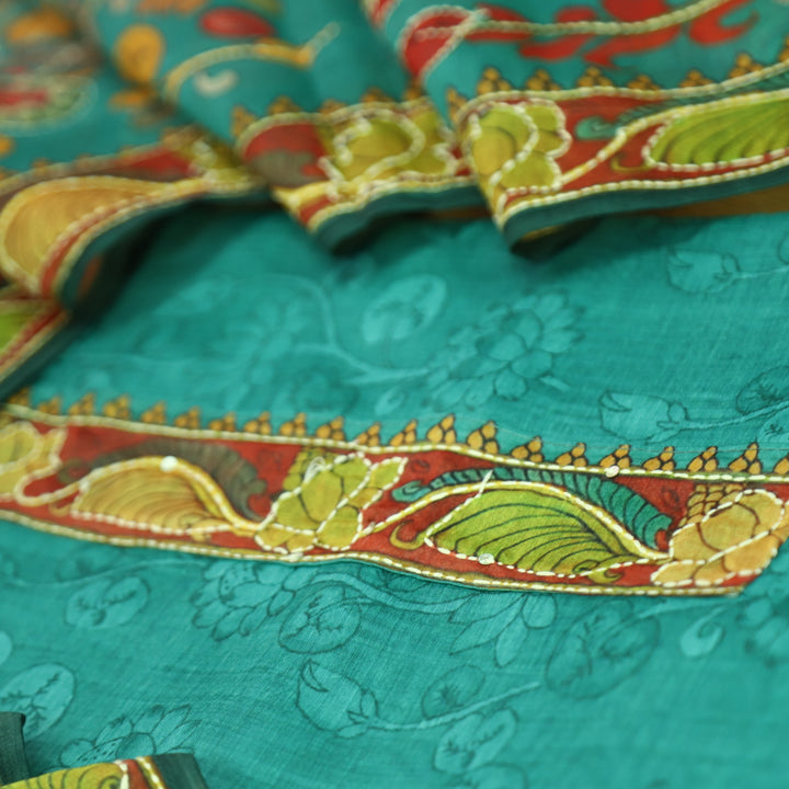 Pranavi Aqua Turquoise Self Printed in Kantha Embroidery Neck Work Chanderi Suit Set