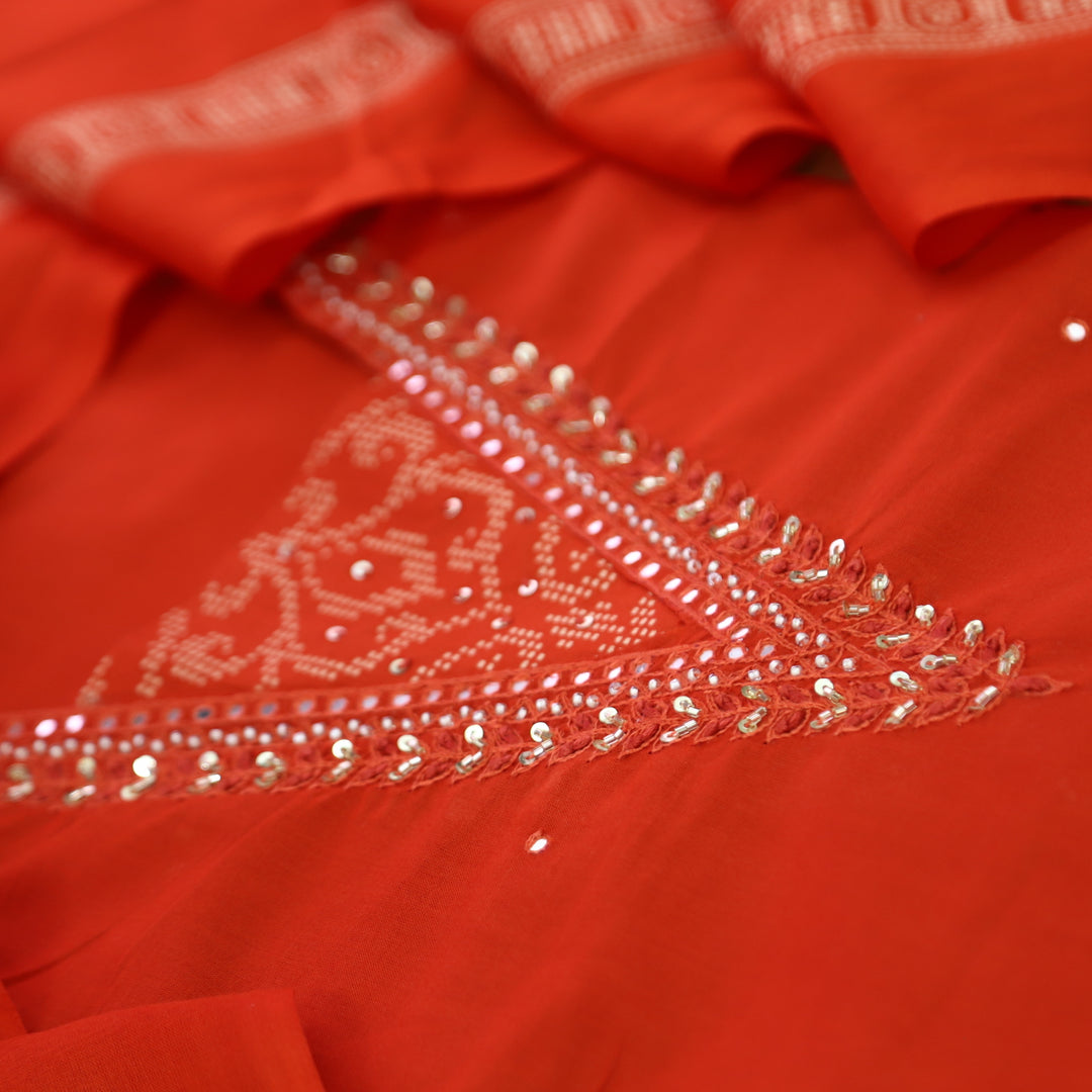 Kashvi Fire Orange Embellish Neckline with Moti Work Detailing Cotton Suit Set