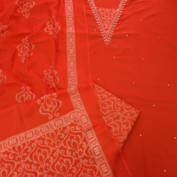 Kashvi Fire Orange Embellish Neckline with Moti Work Detailing Cotton Suit Set