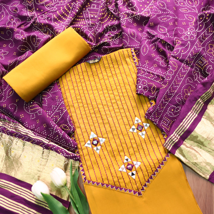 Saheli Turmeric Yellow Thread Embroidered Neck with Mirror Work Roman Silk Set