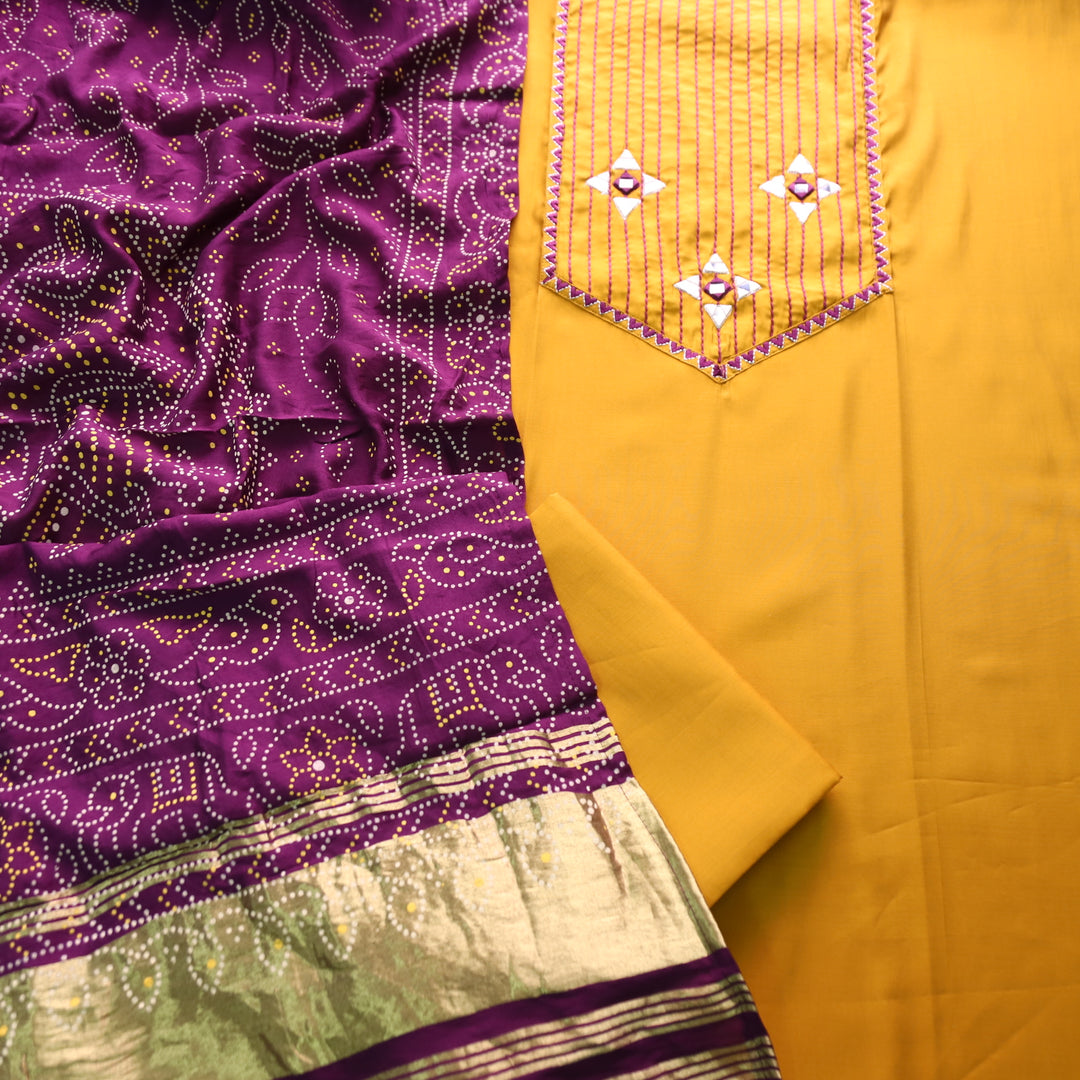 Saheli Turmeric Yellow Thread Embroidered Neck with Mirror Work Roman Silk Set